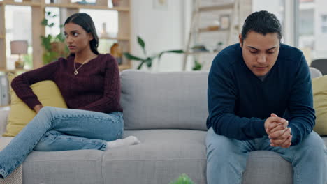 couple, counseling and conflict on sofa in fight