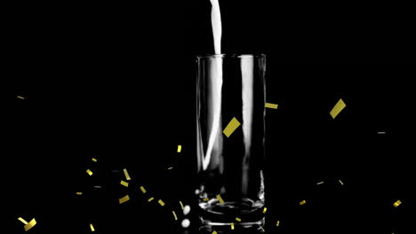 animation of confetti over glass with liquid on black background