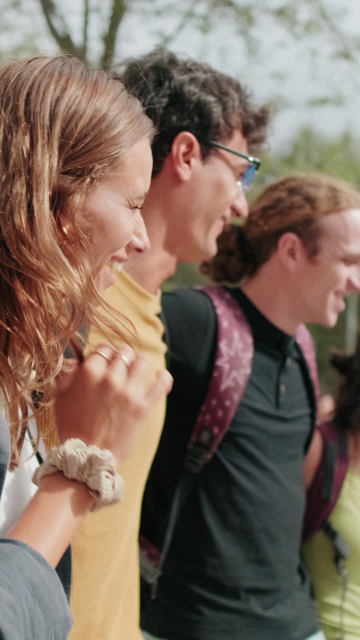 Side view of diverse group of interracial students walking, friendship and