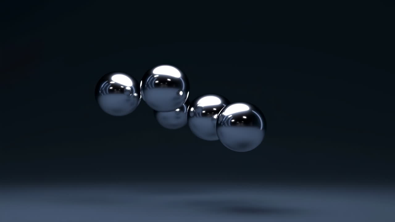 Fluid Movement of Shiny Chrome Spheres Merging Together