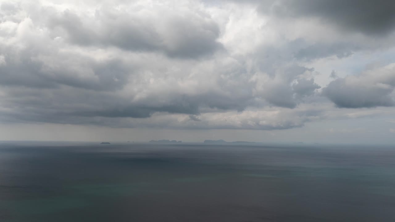 Stormy clouds move over Koh Phi Phi, creating a dramatic coastal scene