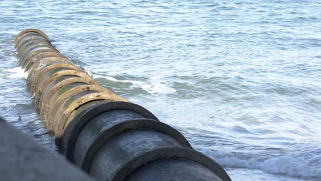 water pollution caused by a water line draining into the river