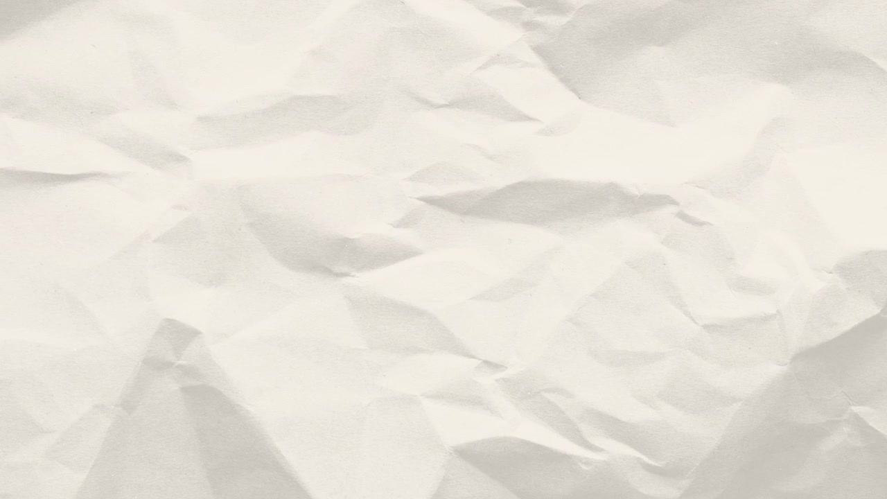 Close-up of Crumpled White Paper Texture Background