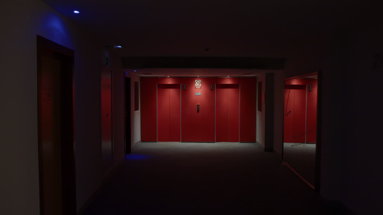 Empty Hotel Elevator Hallway at Night