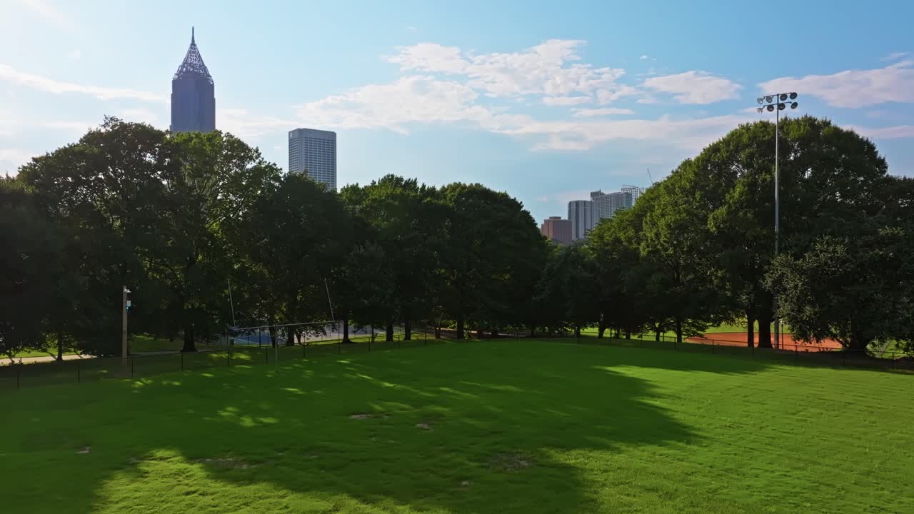 Atlanta Central Park reveals Peachtree Centre skyscraper Bank of America Plaza, skyline buildings, urban park, Georgia, Aerial