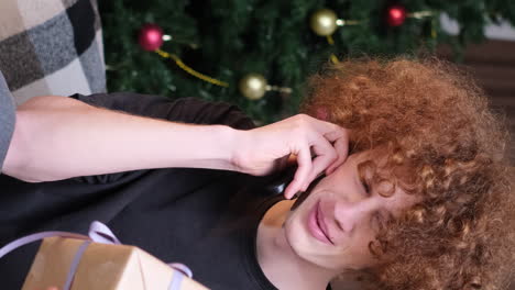 young person's emotional christmas phone call with gift