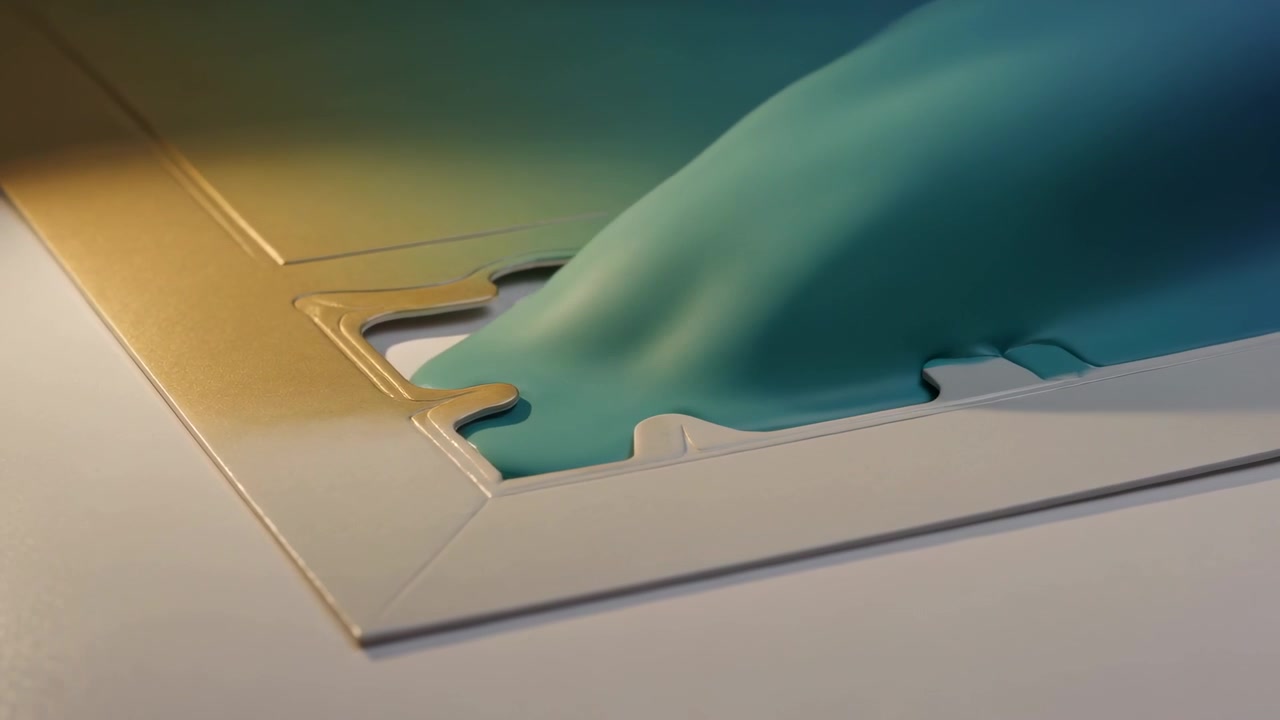 Pouring viscous teal liquid coming from right, filling cardstock cutout on white tabletop