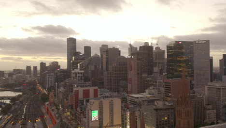 ominous night sky panorama view of buildings urban traffic moving below