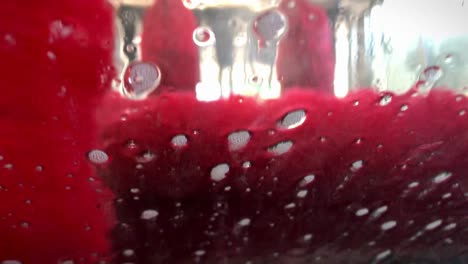 self-serve car wash: approaching rotating brush soap