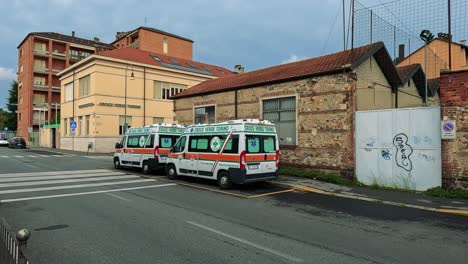 ambulances leaving hospital area in naples, italy