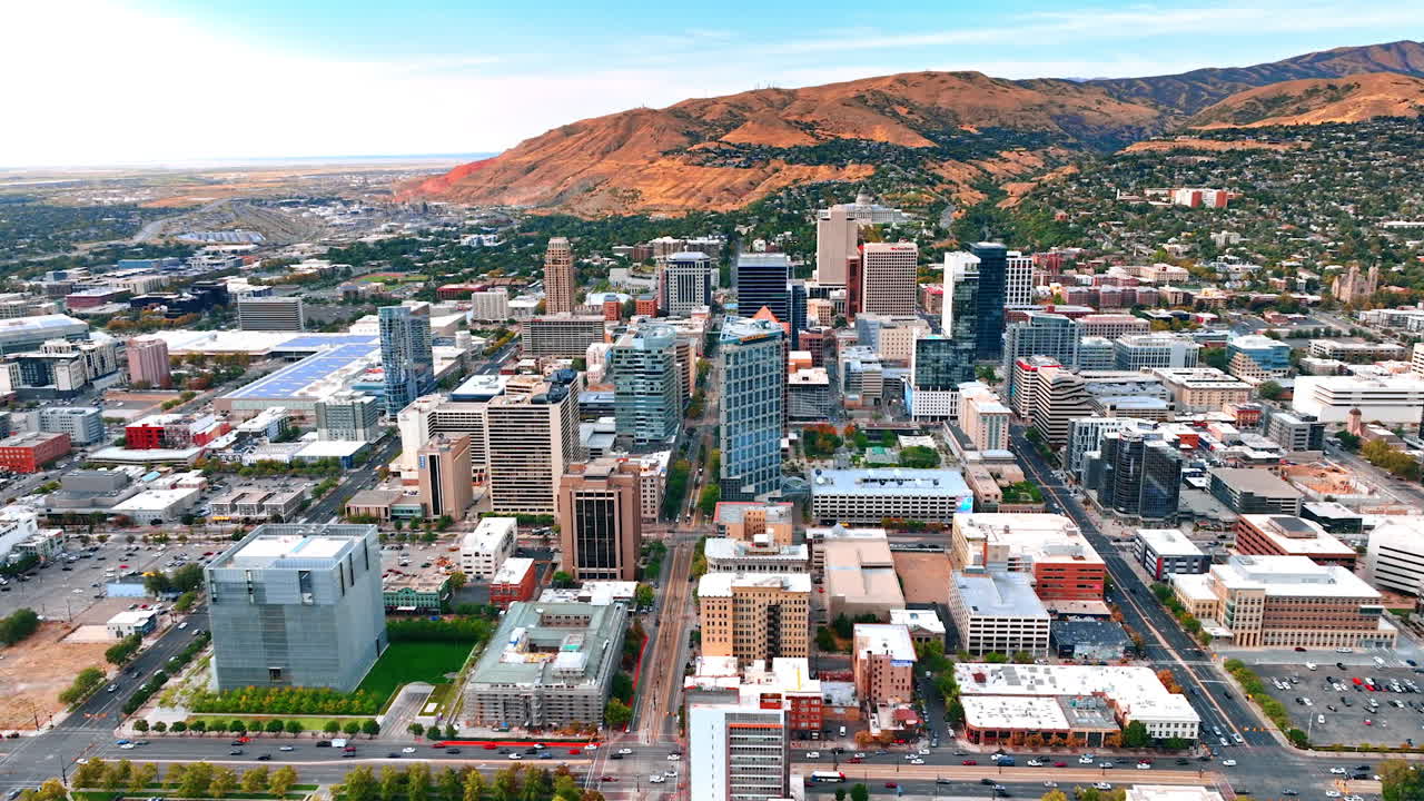 Salt Lake City USA, 1 August 2025: Salt Lake City skyline with mountain range. Aerial shot of Salt Lake City downtown skyline surrounded by Utah mountains