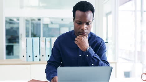 Laptop,-thinking-and-black-man-doing-research