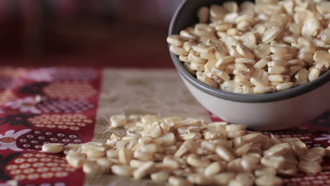 Close-up-white-maize-in-plate-on-African-dashiki-cloth-backdrop