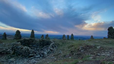 Timelapse of clouds passing overhead at Talkin Fell with stone cairns and stone heart - Brampton, Cumbria