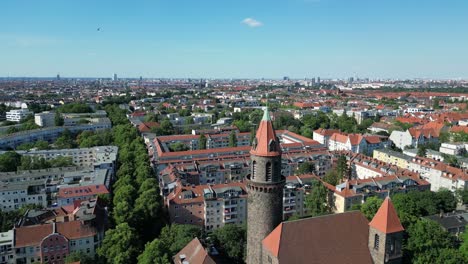 Lovely-aerial-top-view-flight-Lukas-church-city-Berlin-steglitz,-Germany-Summer-day-2023