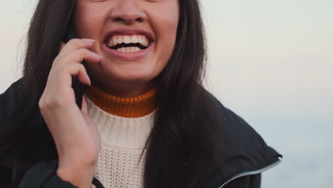 asian girl talking on mobile phone.