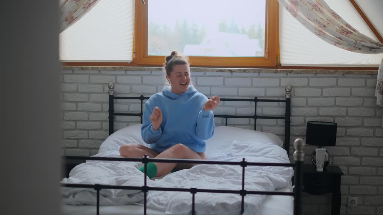 Woman Dancing in a Bedroom