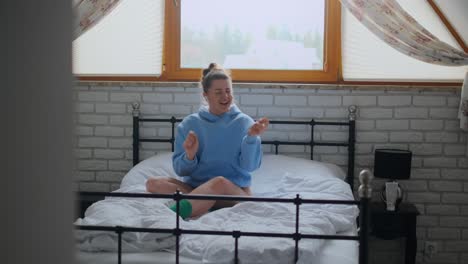 woman dancing in a bedroom