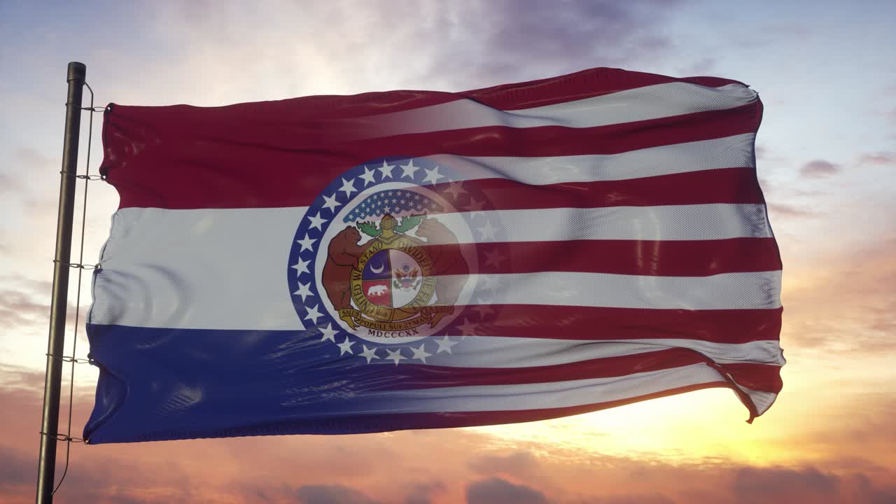 Bandiera del Missouri e degli Stati Uniti sul pennone. Bandiera mista USA e Missouri che fluttua nel vento