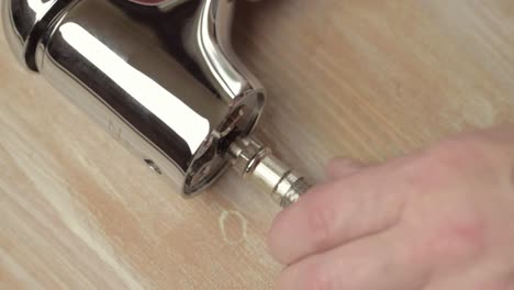 grifo de fontanero con mangueras