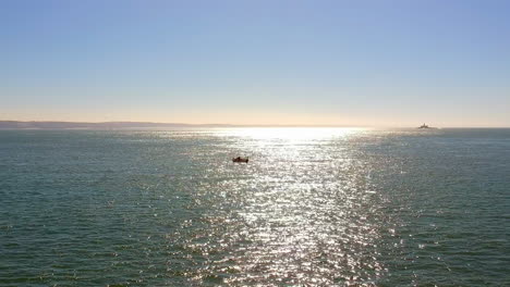 a fishing boat roaming the sea