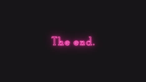 a flickering neon text appearing from the darkness: the end