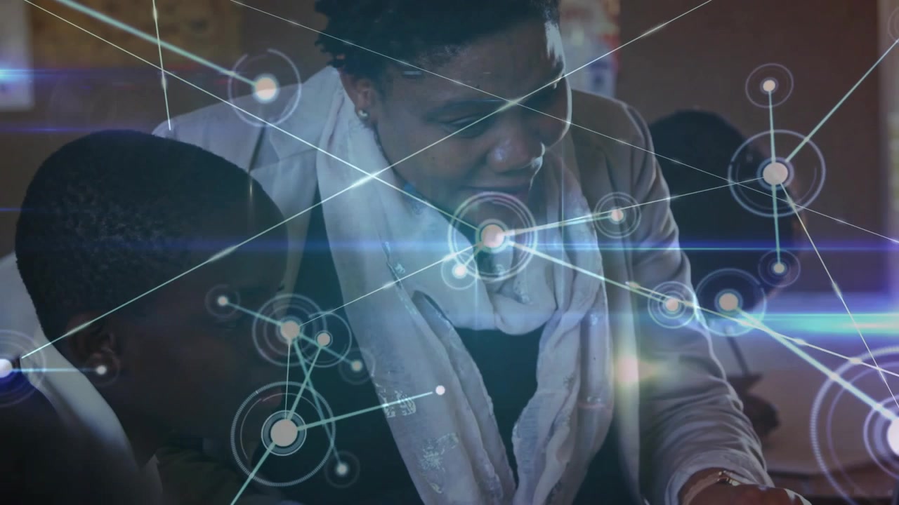 Teacher pointing at tablet screen sparking pulsing digital network overlay guiding student learning