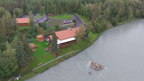 aerial footage a cabin next to the kenai river in alaska