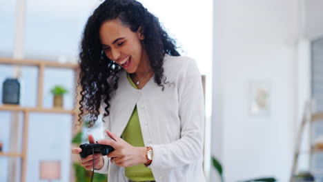 Woman,-celebration-and-video-game-controller