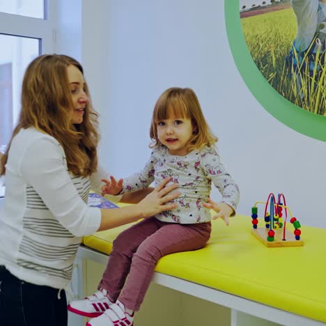 doctor with girl in hospital