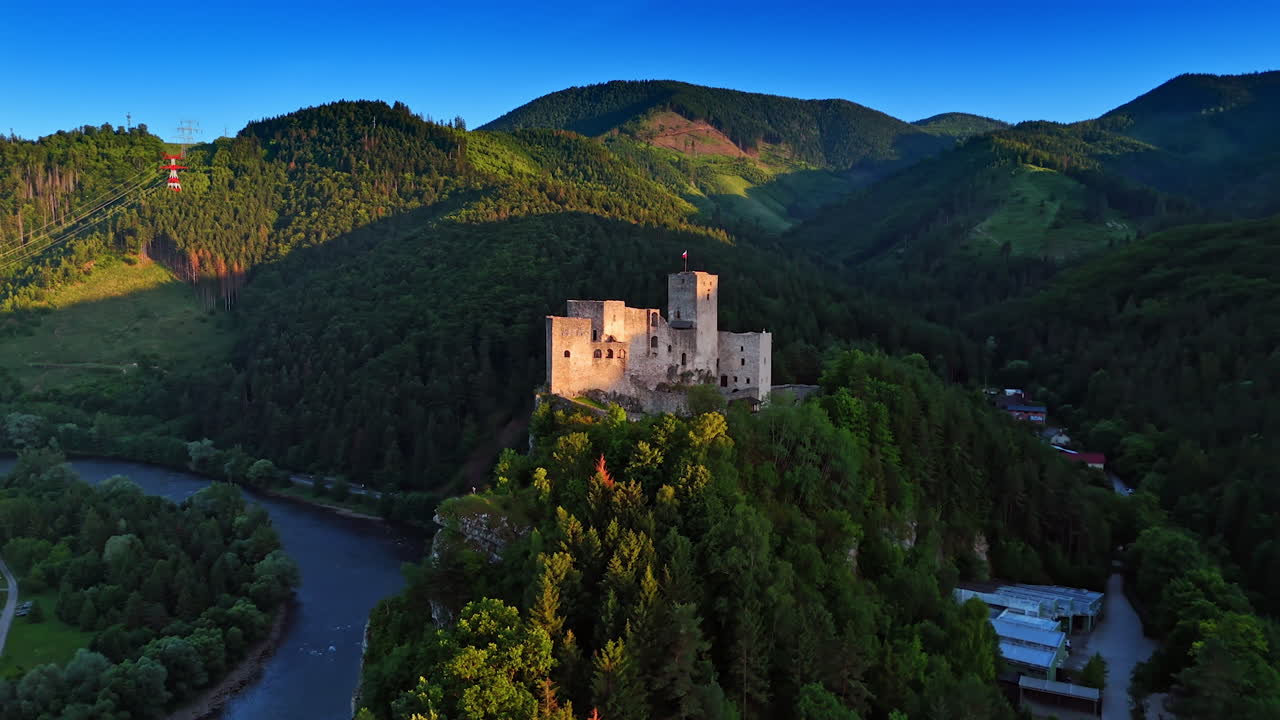 Beautiful medieval Strecno Castle on the mountain top. Spectacular view on the Slovakian nature and landmark from top view