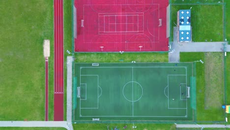 recreational green grass active sports hockey and football fields overhead top down view