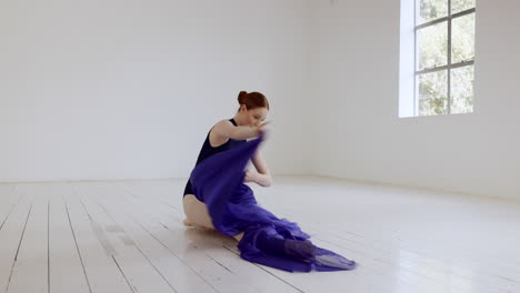 Ballerina-dancer,-sitting-and-floor-with-fabric