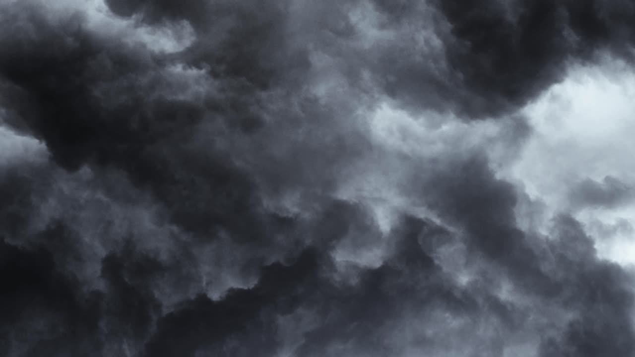 thunderstorm, a flash of lightning that flashes within a dark gray cloud