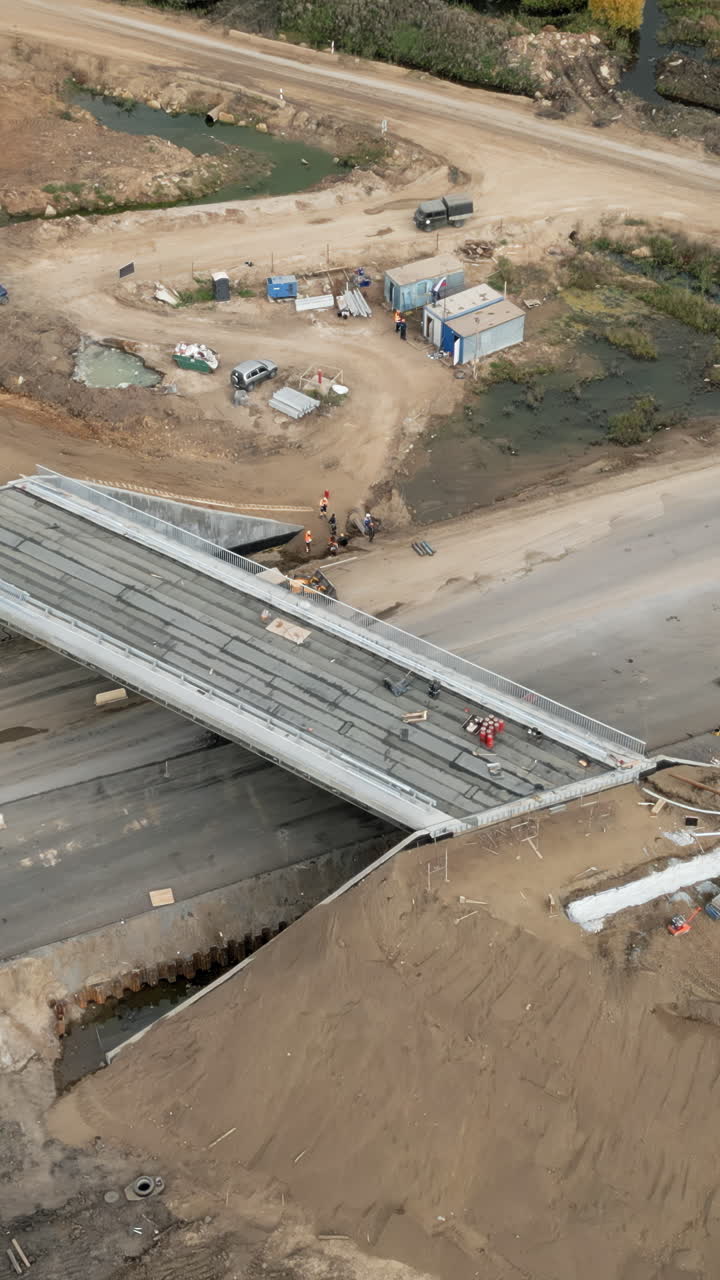Aerial View of an Ongoing Bridge and Road Construction Project