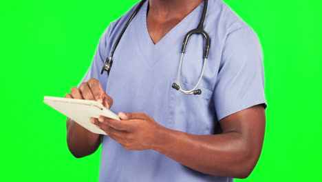 Black-man,-doctor-typing-and-tablet-on-green