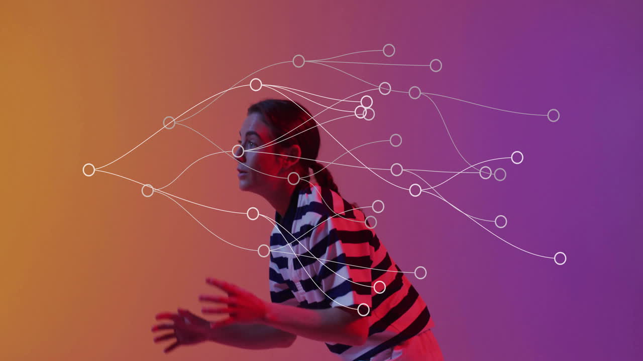 Woman leaning forward in studio, visualizing technology network nodes and flowing data connections