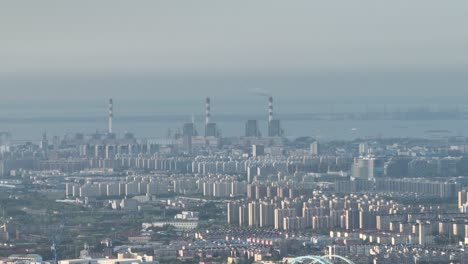 drone aerial view of cityscape and industrial buildings in the city
