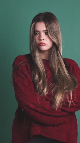 angry young beauty woman standing with arms crossed