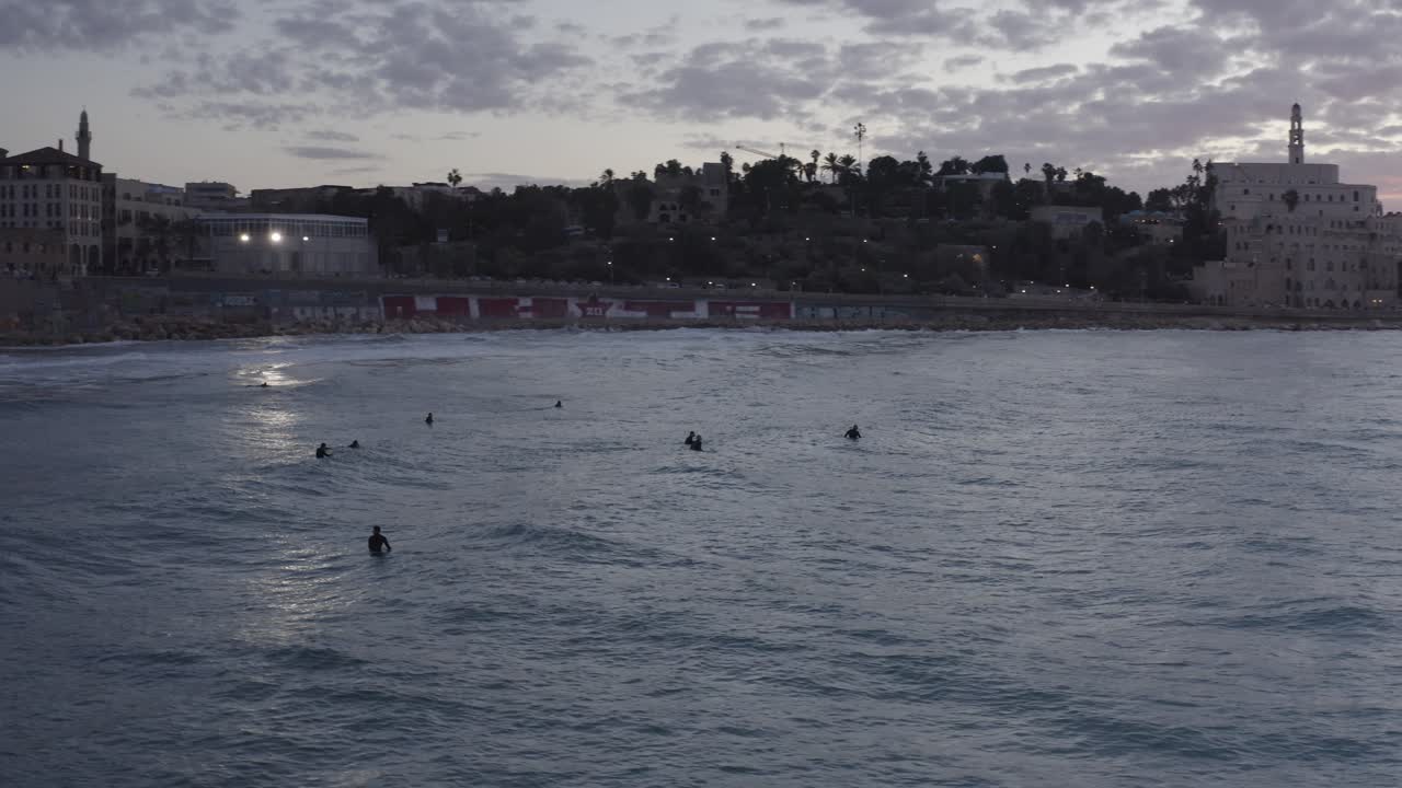 Surfers at Jaffa Sunset