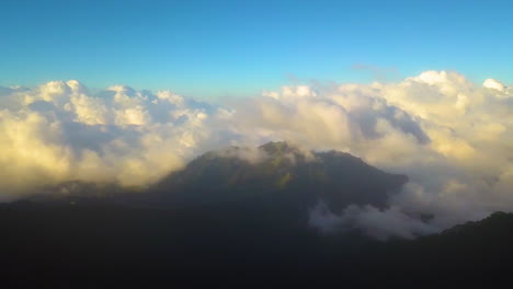 Puffy-clouds-on-top-of-a-tropical-mountain-range