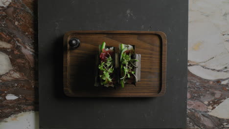 Top-down-shot-of-a-finished-plate-of-sushi-hand-rolls