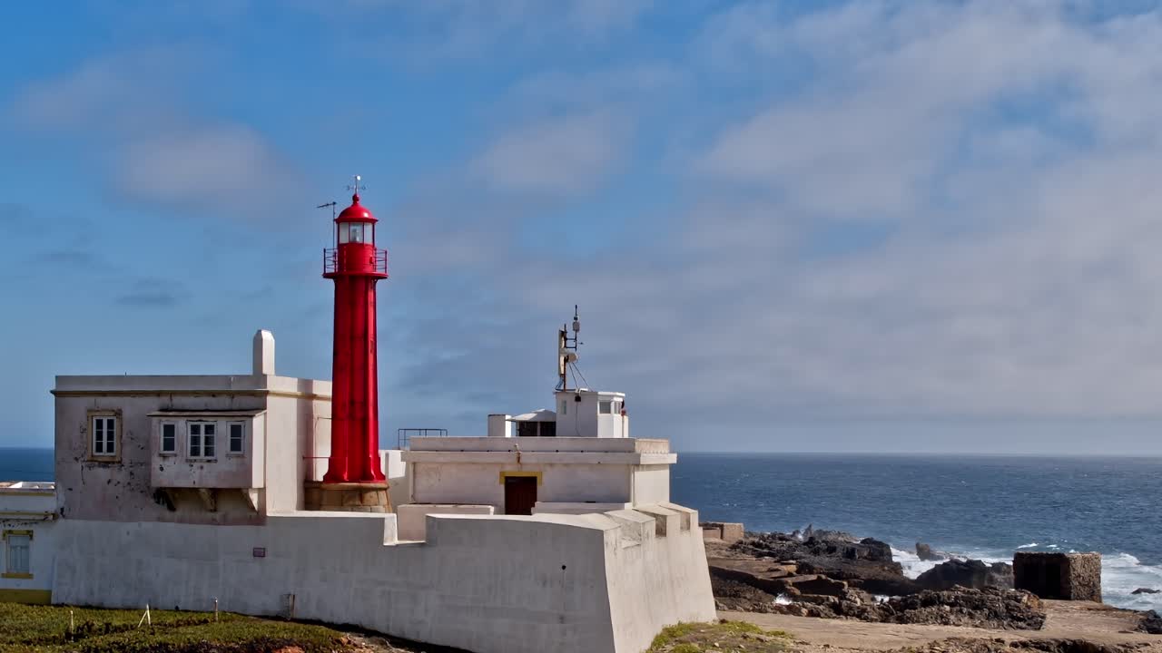Explore coastal Portugal with a lighthouse by the ocean near the shore