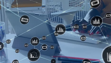 animation of network of connections with icons over african american businessman in office