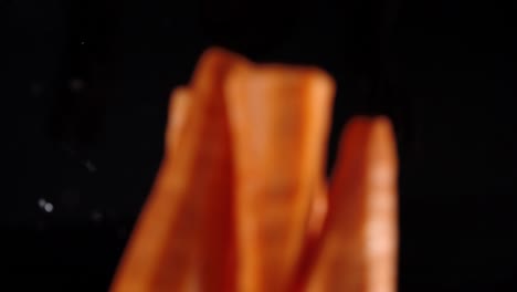 fall carrots into the water with splashes.