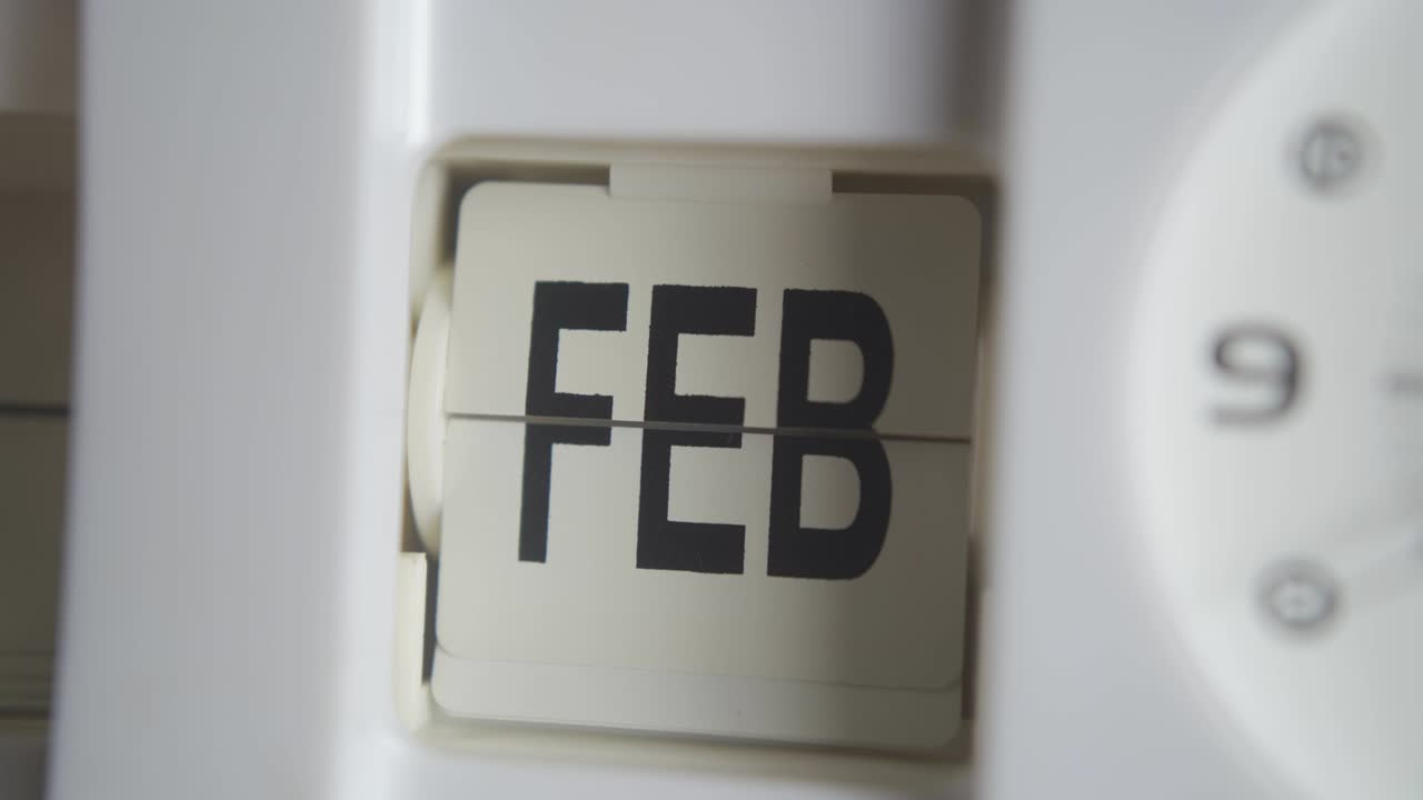 The clock changing the month from February to March