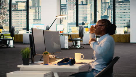 traders in office follow breaking news tv coverage of rare black swan event