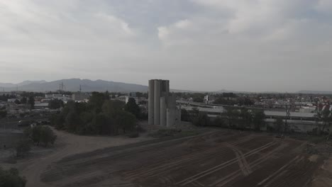 Overflight-in-cuautitlan-mexico,-in-front-of-destroyed-silos