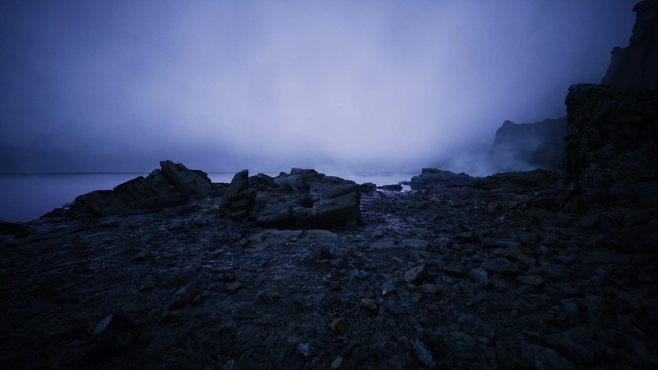 Peaceful rocky coast illuminated by gentle blue lighting atmosphere