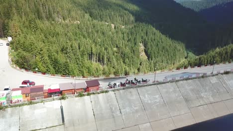 drone shot over a dam on the road to transalpina in romania